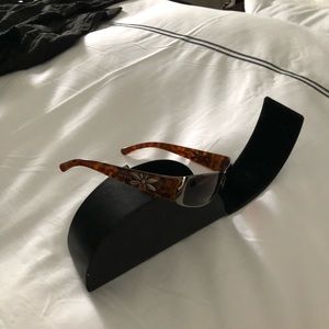 Brown tortuous Prada sunglasses